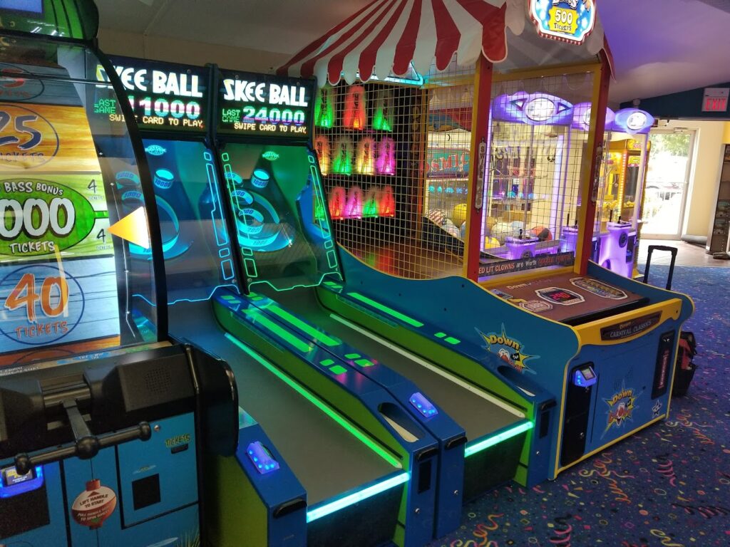 games, skeeball, ball toss, machines